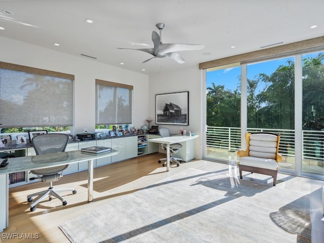 home office featuring ceiling fan, visible vents, wood finished floors, and recessed lighting