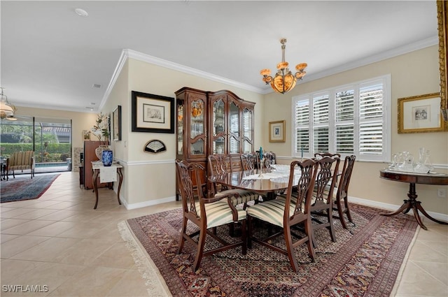 dining area with a chandelier, a wealth of natural light, ornamental molding, and light tile patterned flooring