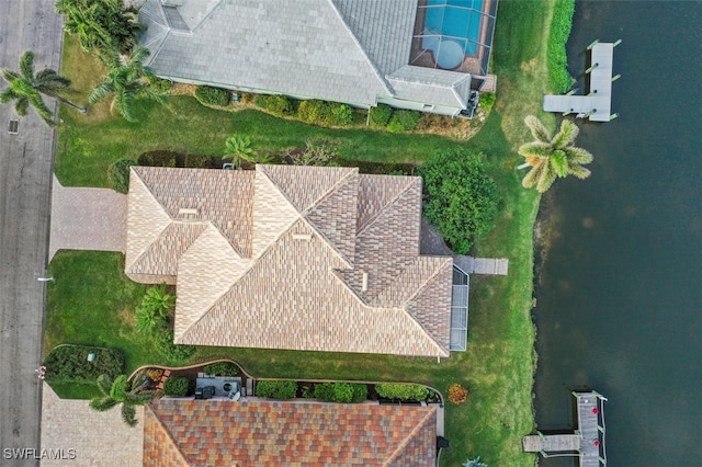 drone / aerial view with a water view