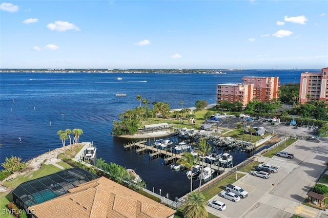 birds eye view of property featuring a water view