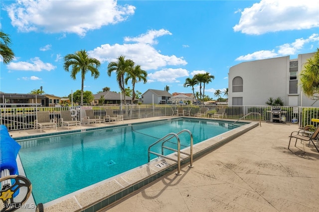 view of pool featuring a patio area