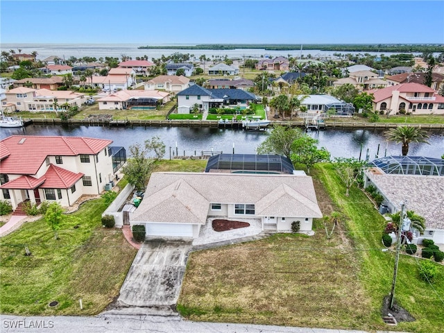 drone / aerial view featuring a water view