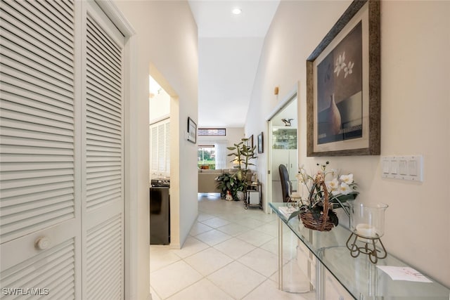 hallway featuring light tile patterned flooring