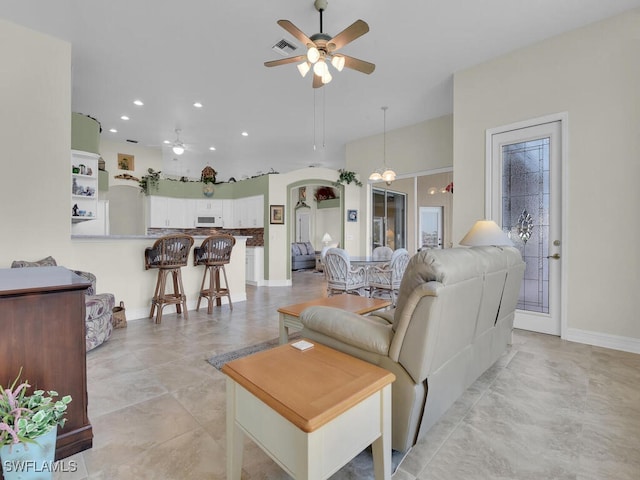 living room with ceiling fan