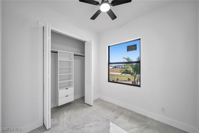 unfurnished bedroom featuring a closet and ceiling fan