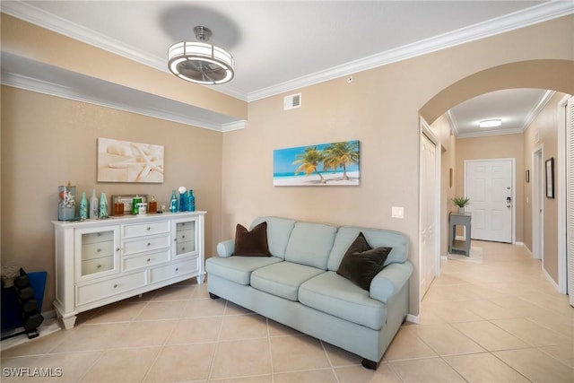 tiled living room with ornamental molding