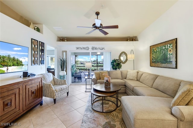 living room with light tile patterned floors and ceiling fan