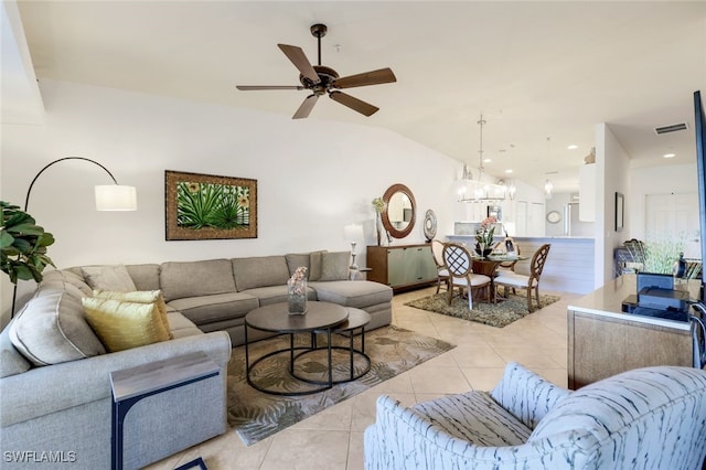 living room featuring light tile patterned floors, ceiling fan, and lofted ceiling