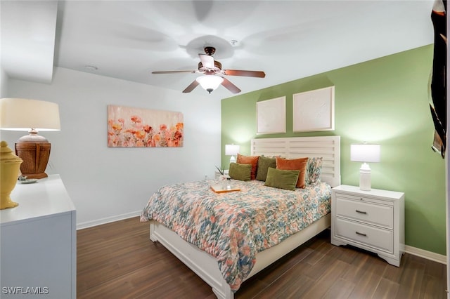 10296 Heritage Bay Blvd Unit 3124, Naples, FL 34120 - bedroom with baseboards, dark wood-style floors, and a ceiling fan