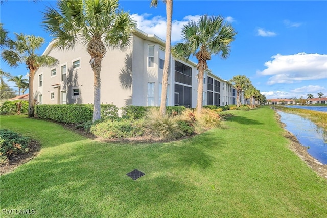 10296 Heritage Bay Blvd Unit 3124, Naples, FL 34120 - view of grassy yard