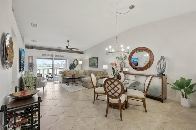 10296 Heritage Bay Blvd Unit 3124, Naples, FL 34120 - dining space with lofted ceiling, light tile patterned floors, a ceiling fan, and a chandelier