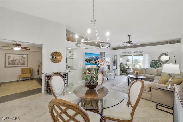 10296 Heritage Bay Blvd Unit 3124, Naples, FL 34120 - dining room with a ceiling fan, light tile patterned floors, and a chandelier