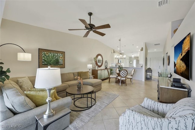 10296 Heritage Bay Blvd Unit 3124, Naples, FL 34120 - living room featuring light tile patterned floors, ceiling fan, lofted ceiling, and a chandelier