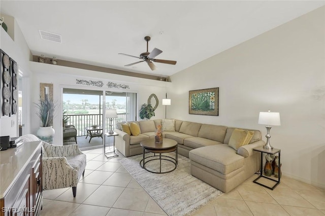 10296 Heritage Bay Blvd Unit 3124, Naples, FL 34120 - living area with ceiling fan, light tile patterned floors, and vaulted ceiling