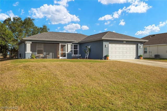 ranch-style house featuring a garage, central air condition unit, and a front lawn