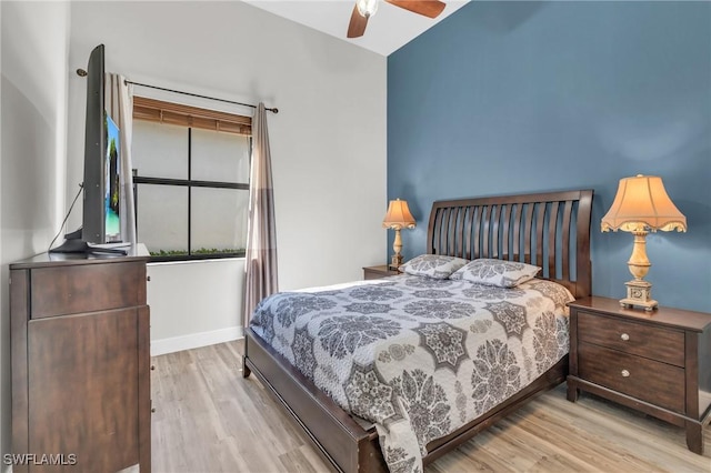 bedroom featuring ceiling fan and light hardwood / wood-style floors