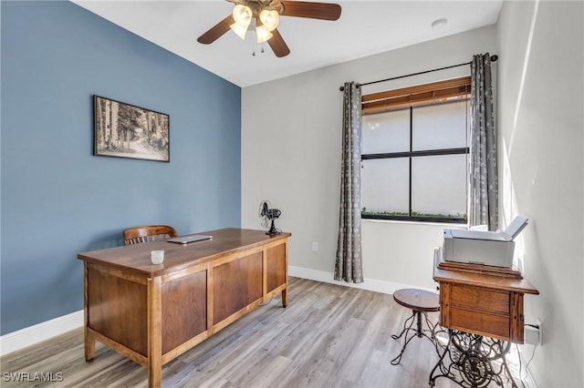 office area with ceiling fan and light wood-type flooring