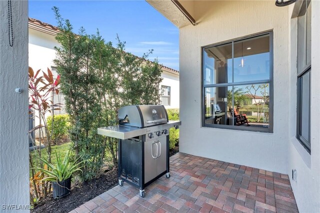 view of patio with a grill