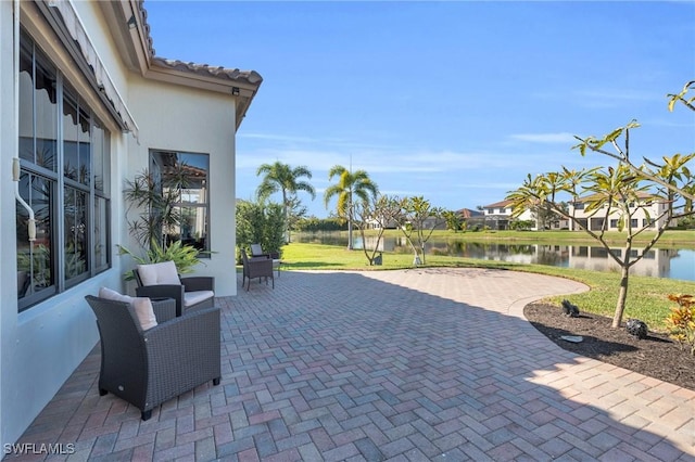 view of patio / terrace featuring a water view