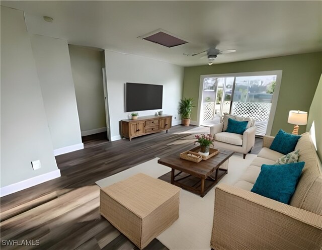 living room featuring ceiling fan and dark hardwood / wood-style floors