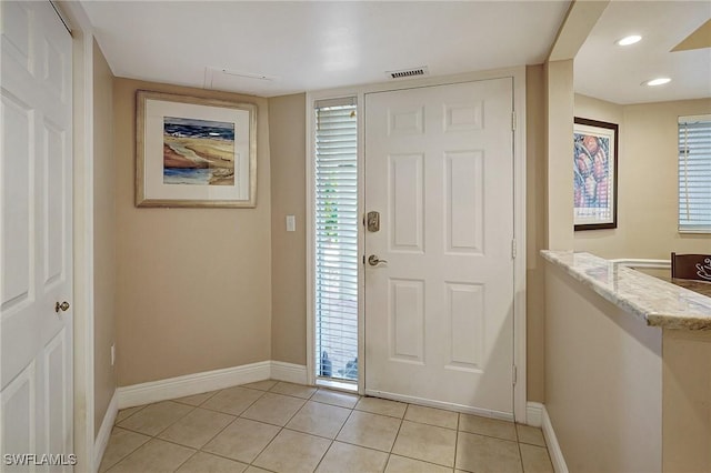 view of tiled foyer