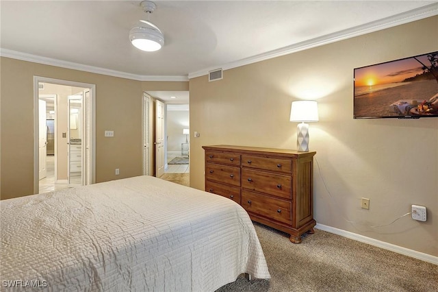 carpeted bedroom featuring ceiling fan, ornamental molding, and connected bathroom