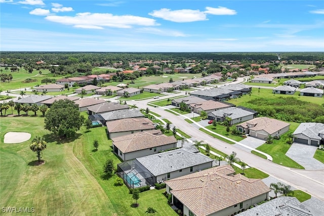 aerial view featuring golf course view and a residential view