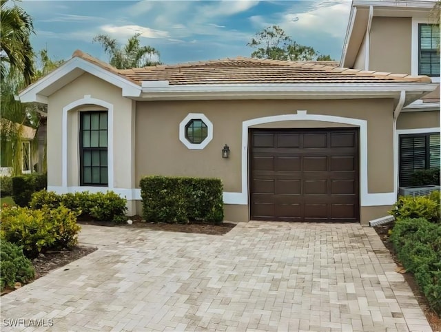 exterior space with a garage