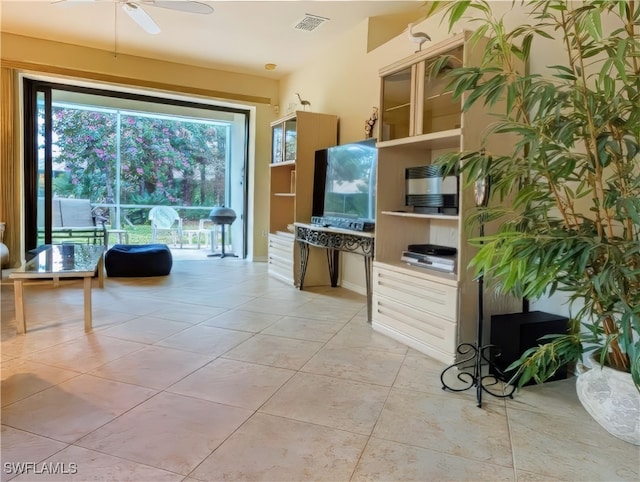 kitchen featuring ceiling fan and light tile patterned flooring