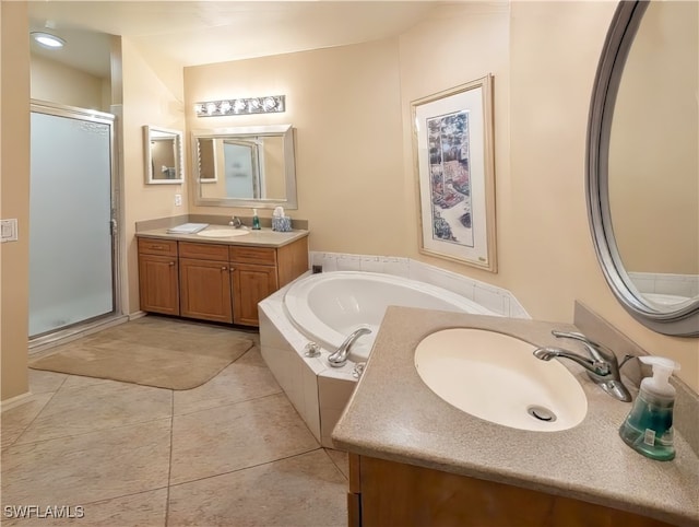 bathroom with vanity, tile patterned floors, and independent shower and bath