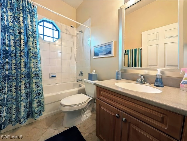 full bathroom with tile patterned flooring, shower / bath combination with curtain, vanity, and toilet