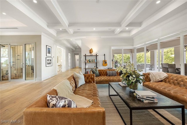 living room featuring beam ceiling, light hardwood / wood-style floors, a healthy amount of sunlight, and coffered ceiling