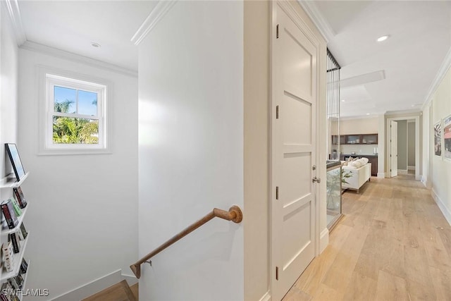 661 6th Ave N, Naples, FL 34102 - hallway featuring an upstairs landing, light wood-style floors, and crown molding