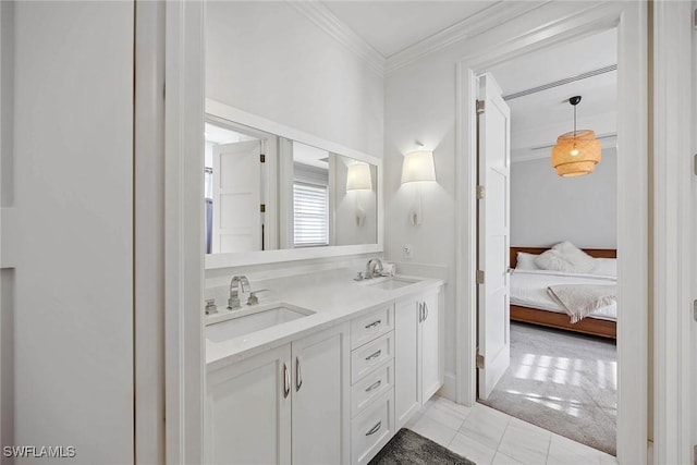 bathroom featuring tile patterned floors, vanity, and ornamental molding