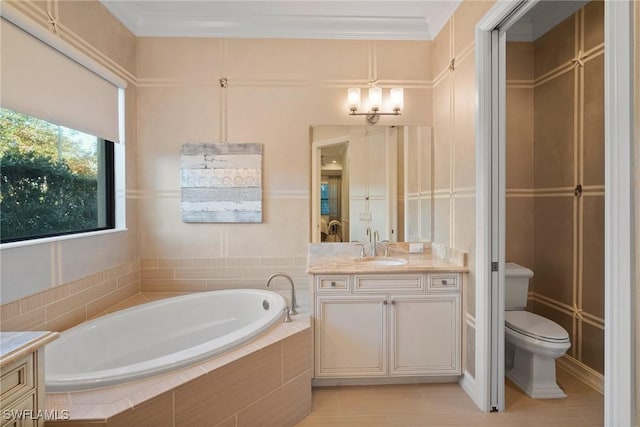 bathroom with an inviting chandelier, tile patterned floors, tiled tub, toilet, and vanity