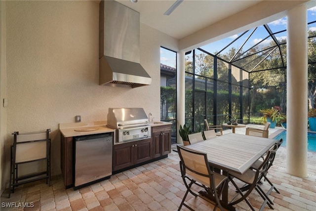 view of patio / terrace with glass enclosure, an outdoor kitchen, sink, a swimming pool, and area for grilling