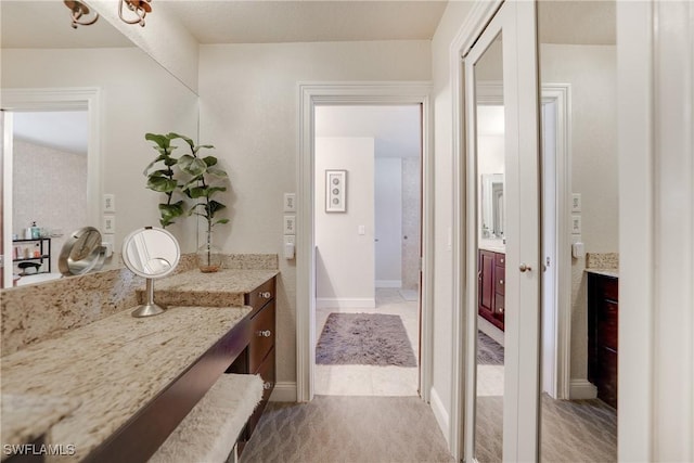 bathroom featuring vanity and tile patterned floors