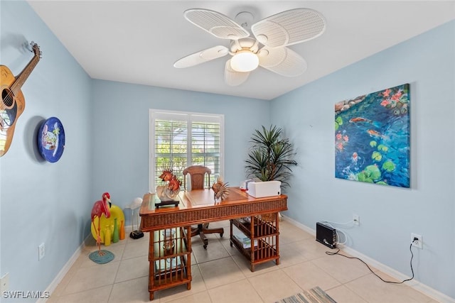 office area with ceiling fan and light tile patterned flooring