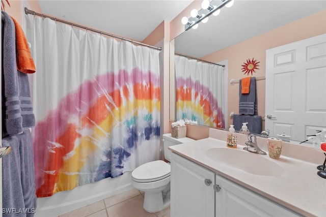 full bathroom with tile patterned floors, vanity, toilet, and shower / tub combo