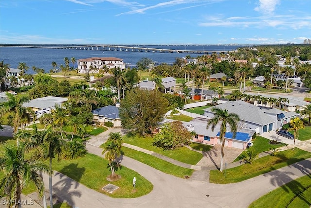 drone / aerial view with a water view