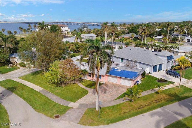 bird's eye view with a water view