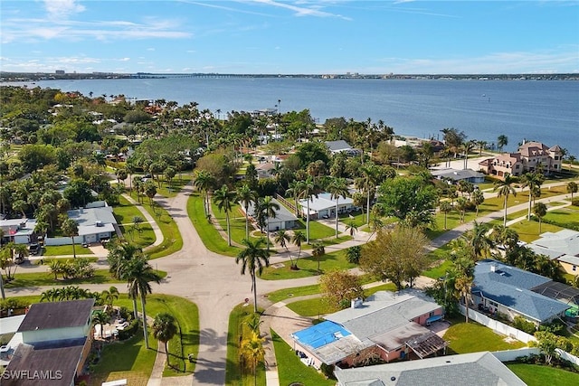 bird's eye view with a water view