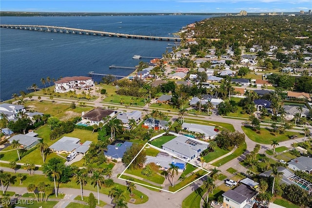 drone / aerial view with a water view