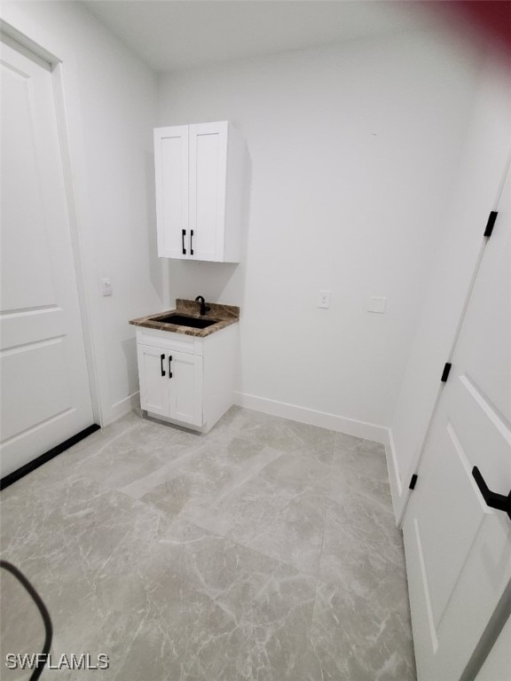 laundry room featuring sink