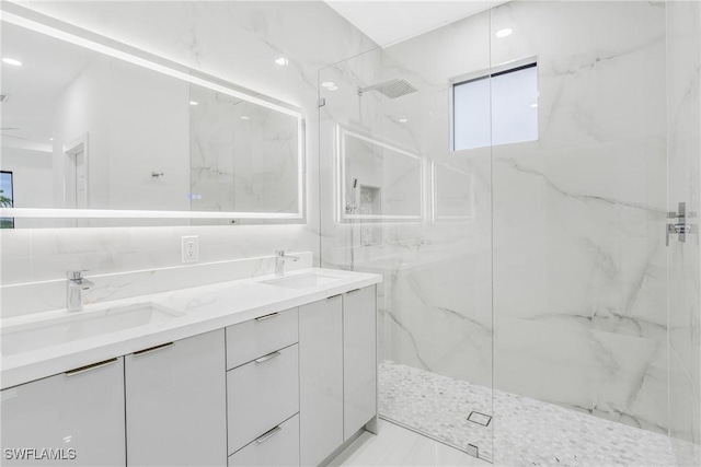 bathroom featuring vanity and walk in shower