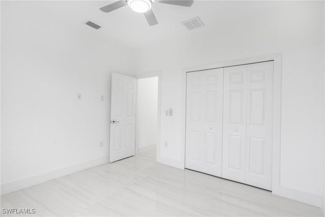 unfurnished bedroom featuring a closet and ceiling fan