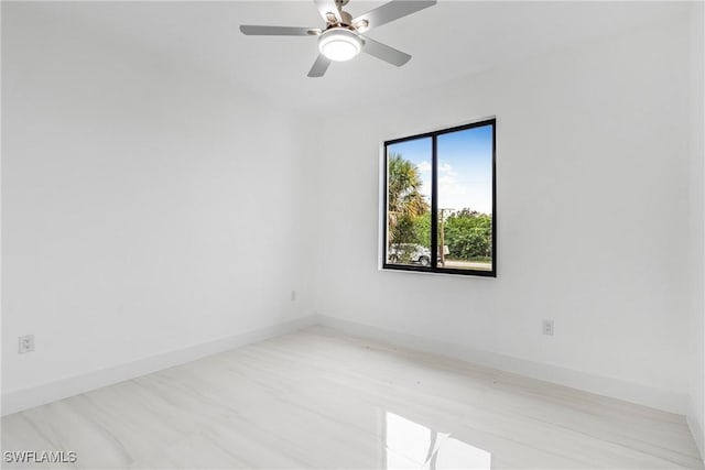 empty room featuring ceiling fan