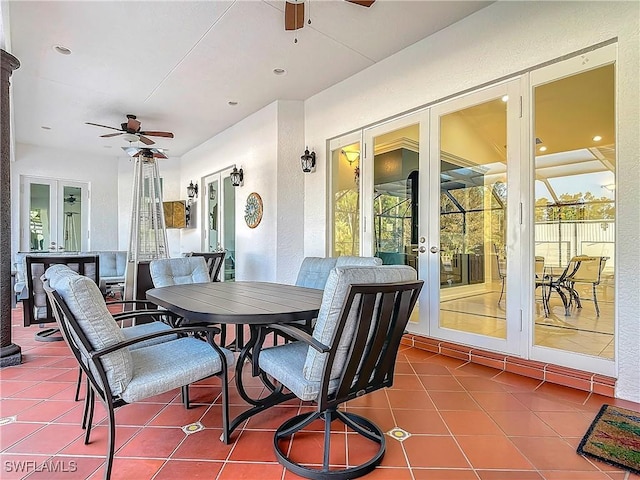 view of patio with french doors and ceiling fan