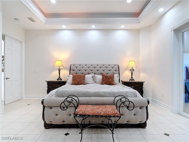 bedroom featuring light tile patterned flooring, ornamental molding, and a tray ceiling