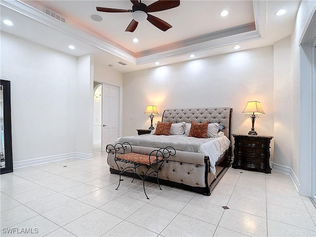 tiled bedroom featuring ceiling fan, ornamental molding, and a raised ceiling